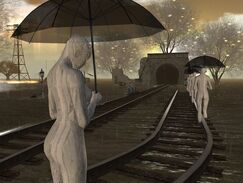 Statues with heads bowed holding umbrellas walking along a train track.